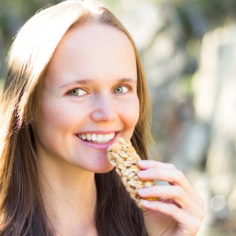 Petra Scott eating granola bar