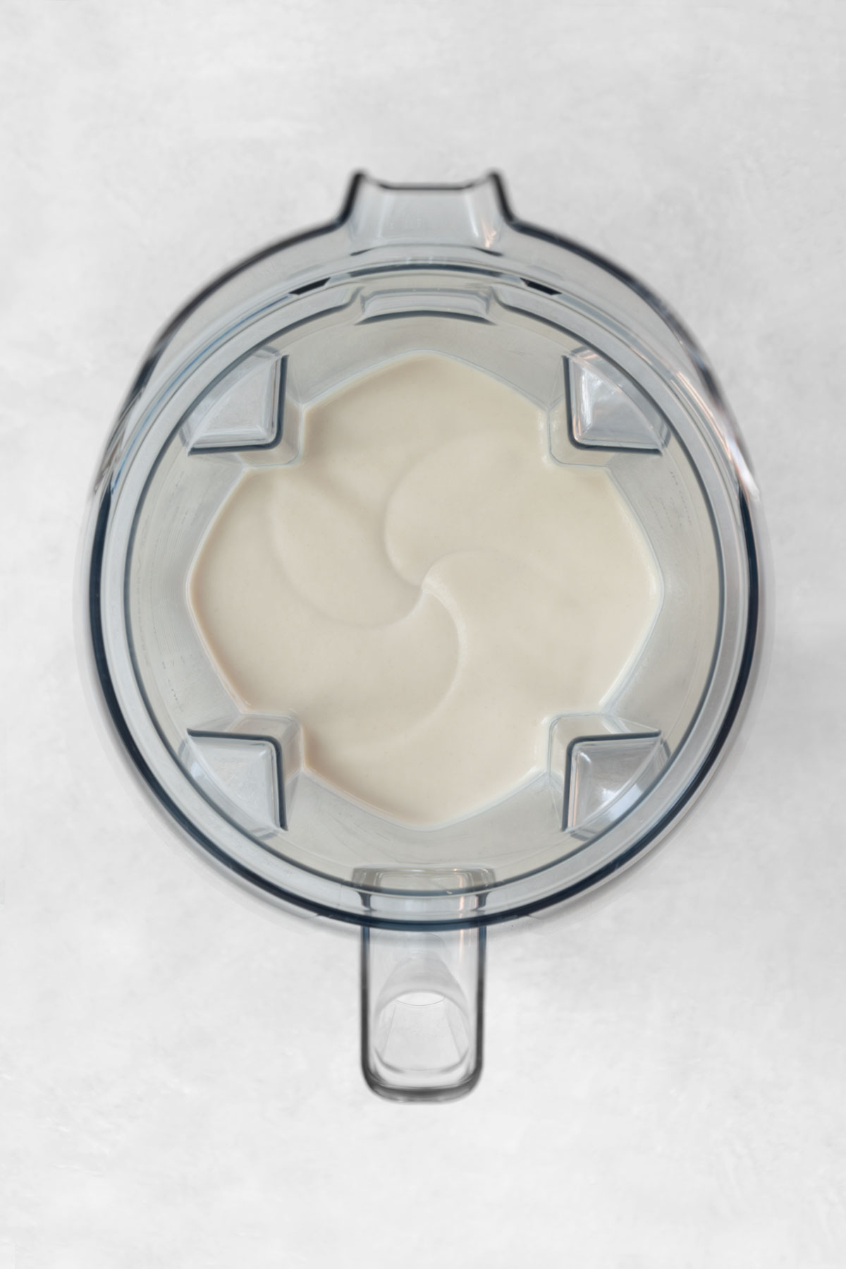 raw lime cheesecake filling in a Vitamix blender